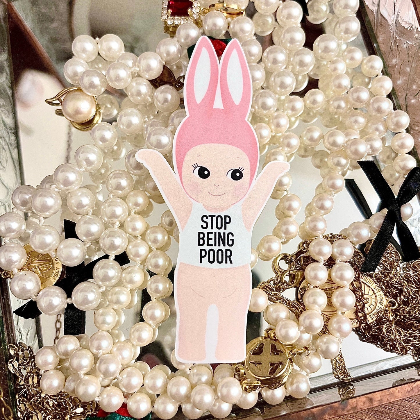 kewpie angel stop being poor sticker